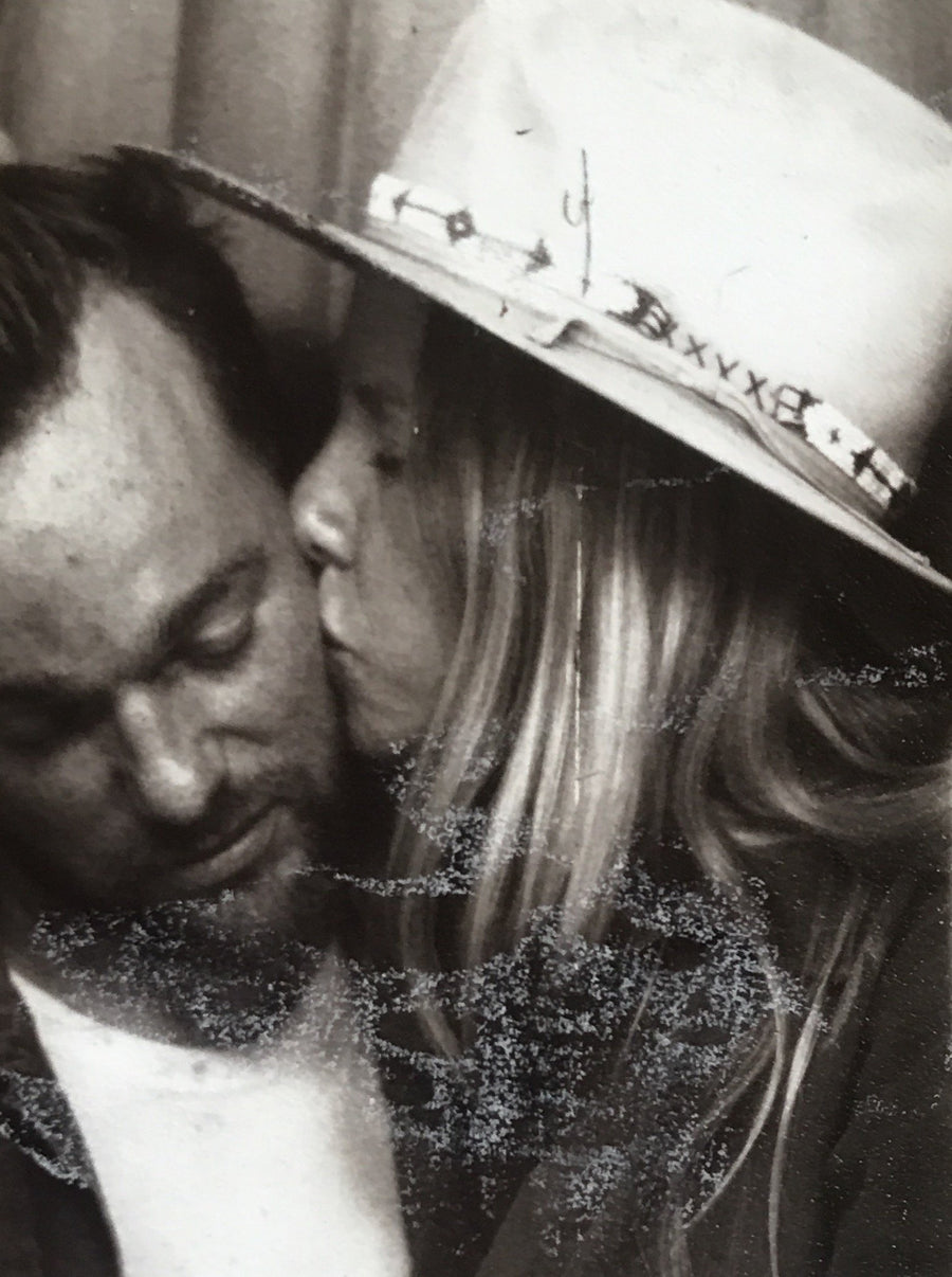 Jada and Jon kissing, black and white