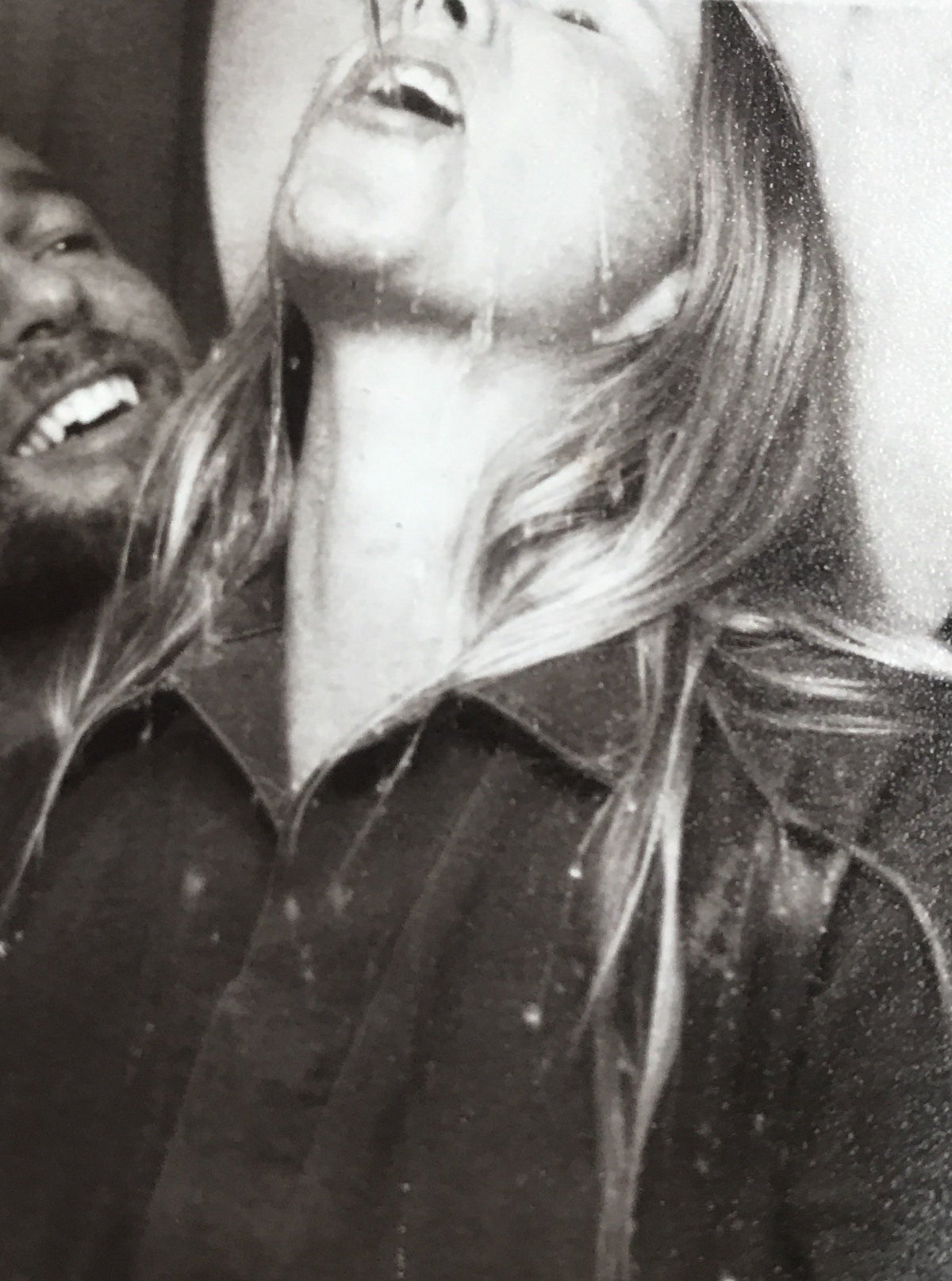 Jada laughing, black and white