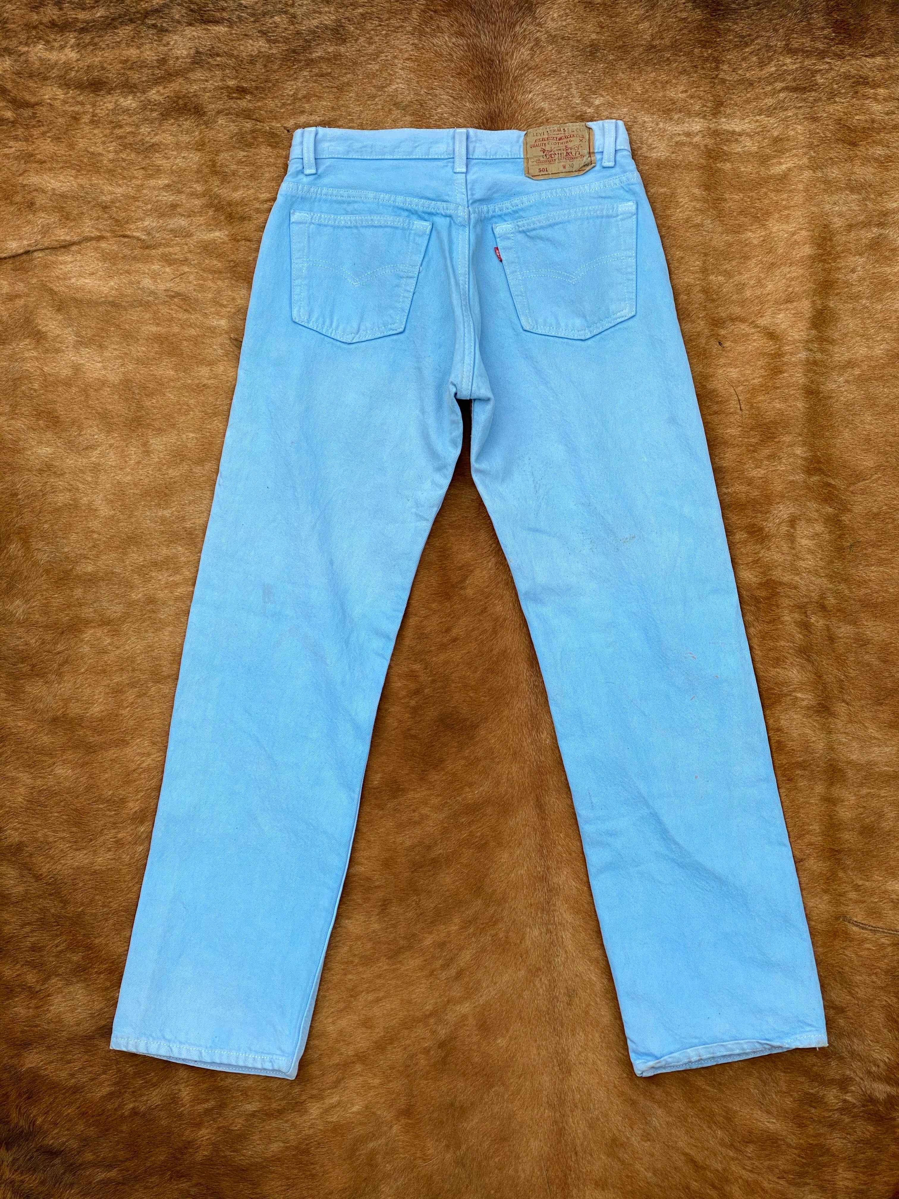 Brown and blue Levi chap jeans